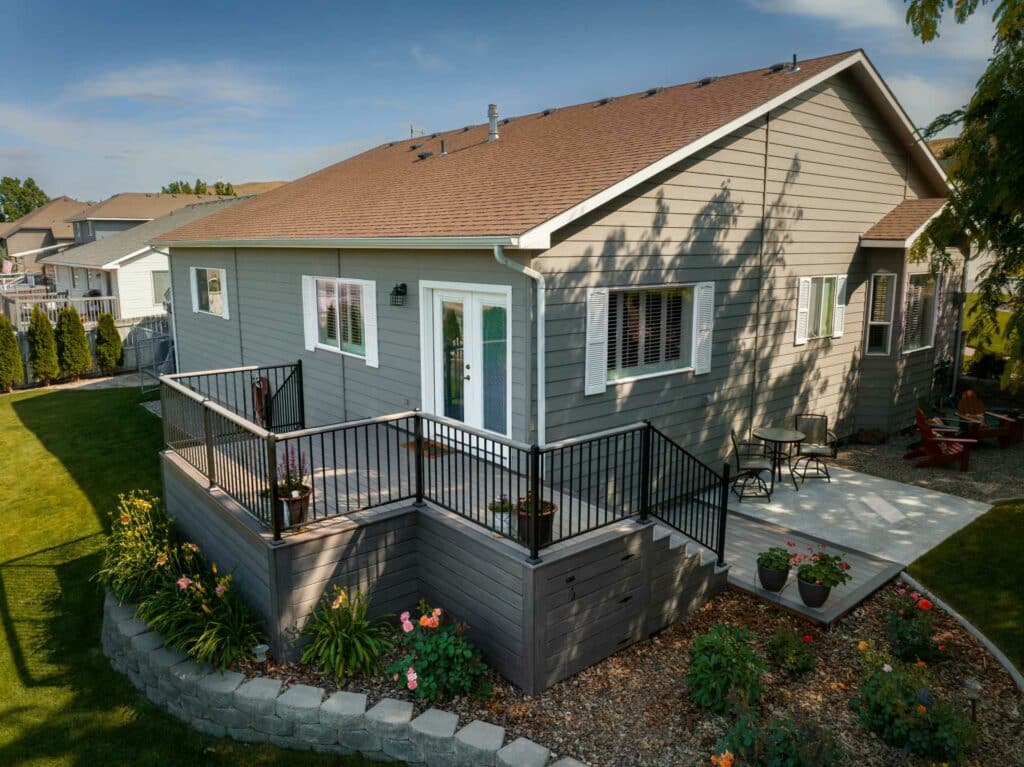 deck railing perfectly installed in a home by Simpson Decks and Construction